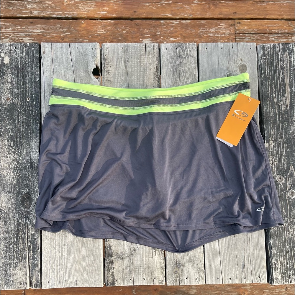 Brand New with Tags athletic skirt with shorts built in.